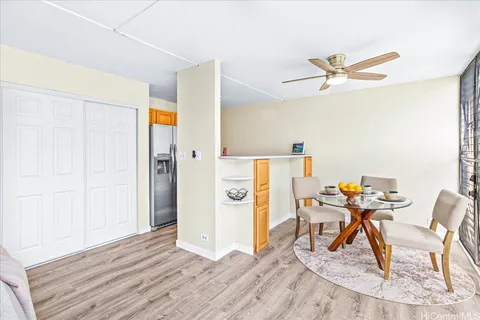 a work room with furniture and wooden floor
