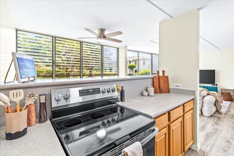a kitchen with a stove and a microwave