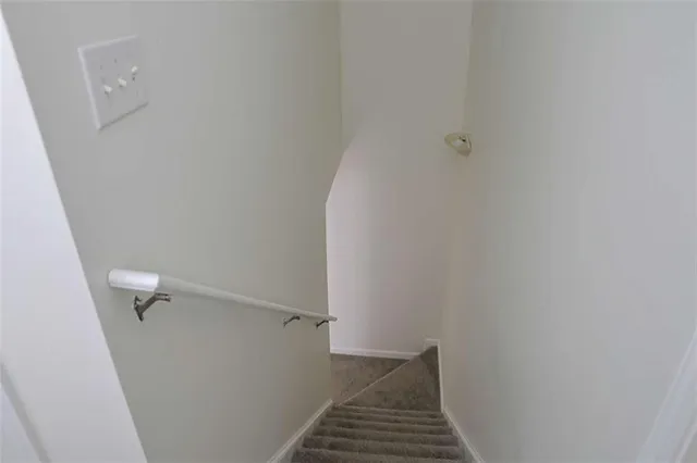 an empty room with closet area