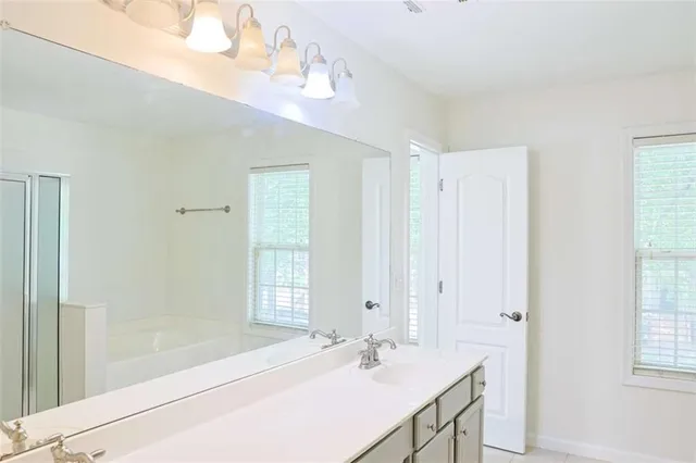 a view of a backyard with garden and plants