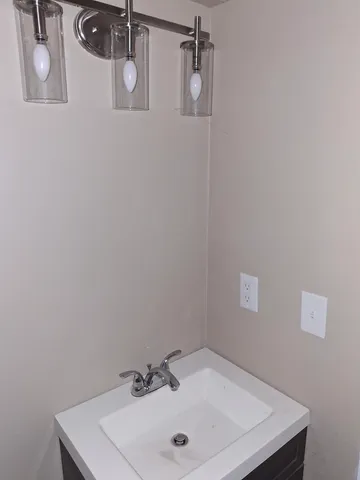 a view of staircase with wooden floor and windows