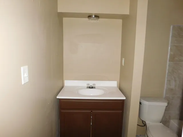 a bathroom with a sink and bathtub