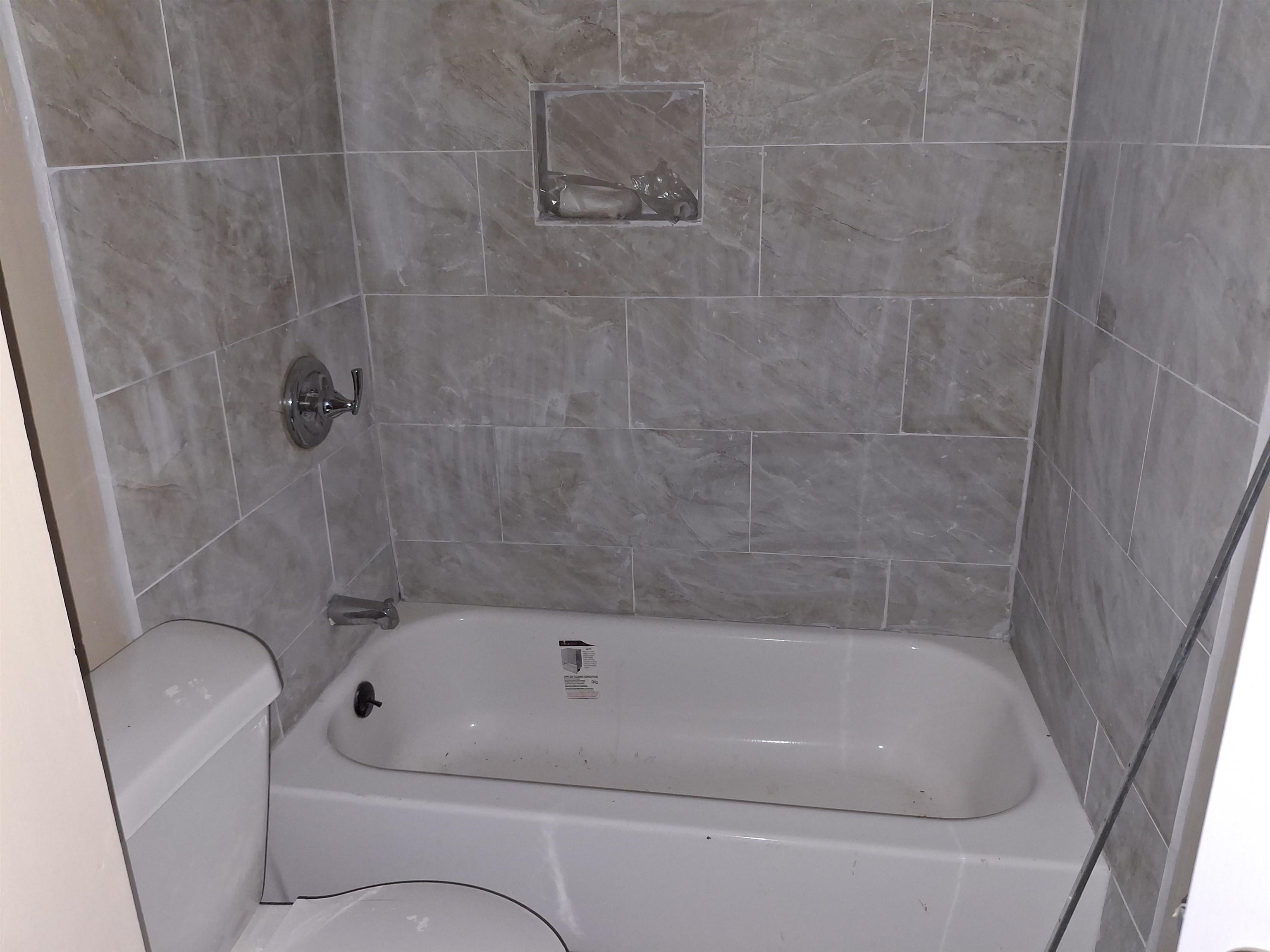 3554 Morning Dew Court, Unit 11 Memphis, TN 38118 - Photo 21 of 25 a bathroom with a sink and bathtub