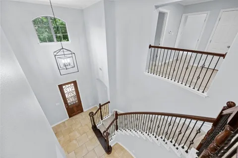 a view of a hallway with windows