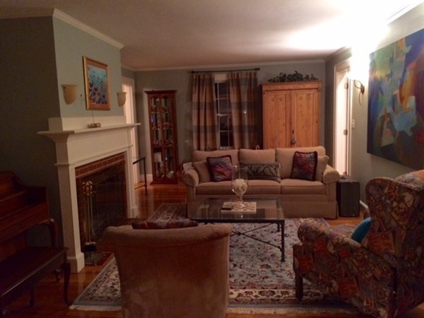 5 Leicester Road Marblehead, MA 01945 - Photo 2 of 30 a living room with furniture and a fireplace