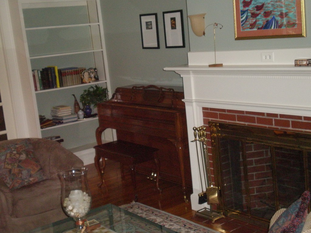5 Leicester Road Marblehead, MA 01945 - Photo 3 of 30 a living room with furniture and a fireplace