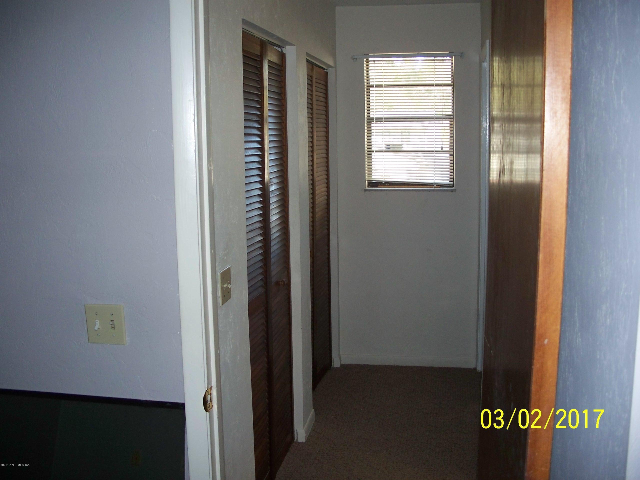 4429 Southwest 20th Lane Gainesville, FL 32607 - Photo 6 of 12 a view of an entryway of a house