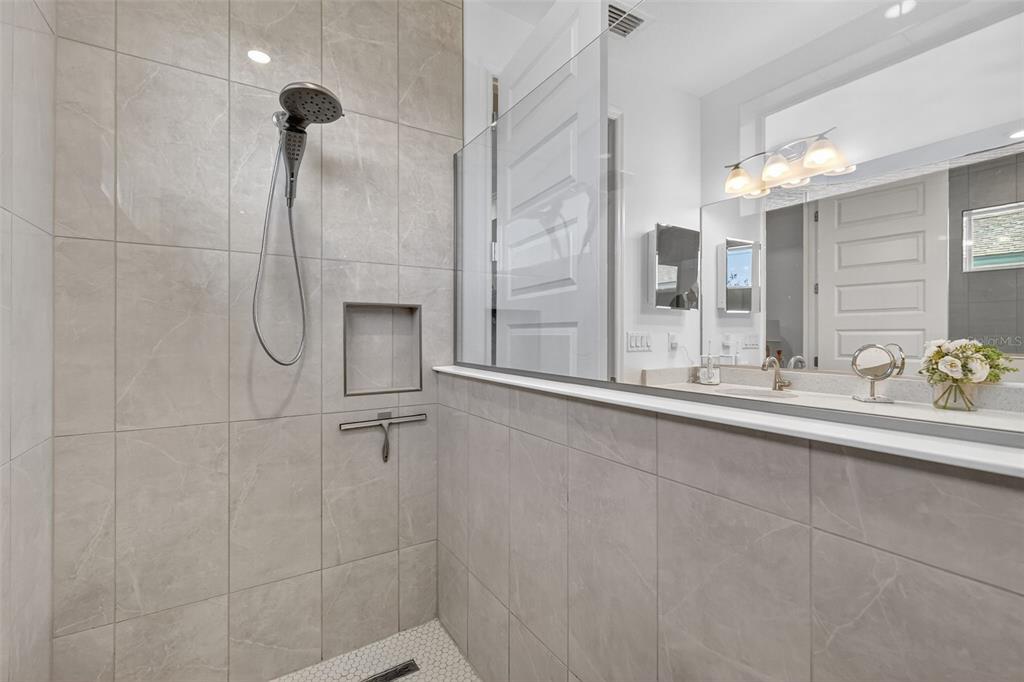 8433 Southwest 98th Terrace Road Ocala, FL 34481 - Photo 20 of 30 a bathroom with a sink and a mirror