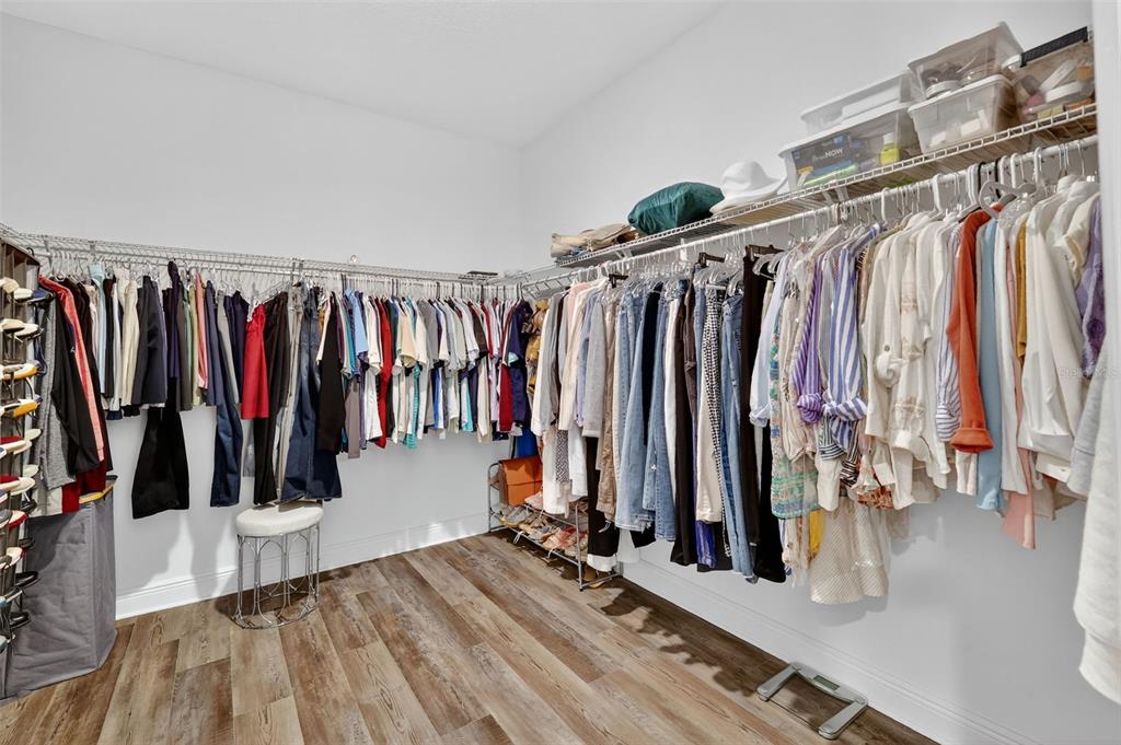 8433 Southwest 98th Terrace Road Ocala, FL 34481 - Photo 22 of 30 a view of walk in closet with clothes