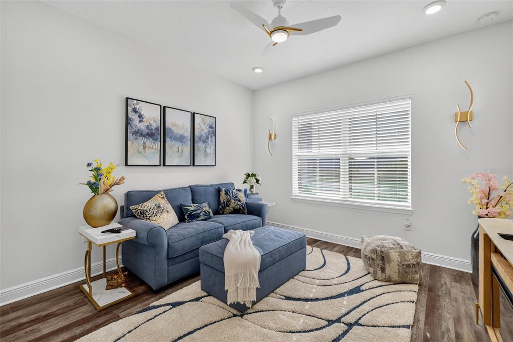 8433 Southwest 98th Terrace Road Ocala, FL 34481 - Photo 23 of 30 a living room with furniture and window