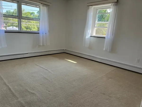 an empty room with a window