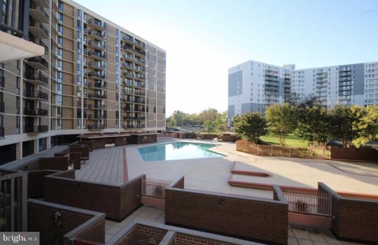 6800 Fleetwood Road, Unit 214 McLean, VA 22101 - Photo 16 of 22 a view of roof with outdoor seating