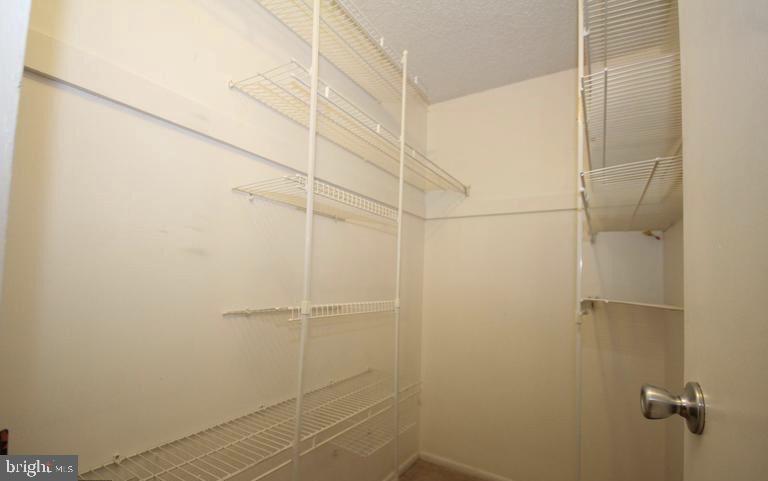 6800 Fleetwood Road, Unit 214 McLean, VA 22101 - Photo 9 of 22 a bathroom with a shower