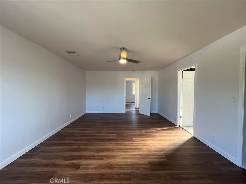 7522 Balcom Avenue Reseda, CA 91335 - Photo 15 of 22 a view of an empty room and wooden floor