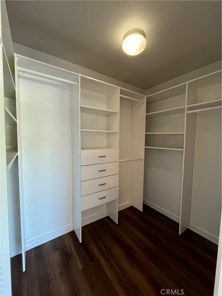 7522 Balcom Avenue Reseda, CA 91335 - Photo 19 of 22 a view of walk in closet with empty racks