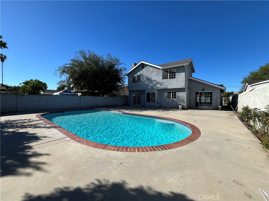 7522 Balcom Avenue Reseda, CA 91335 - Photo 22 of 22 a front view of a house with a yard