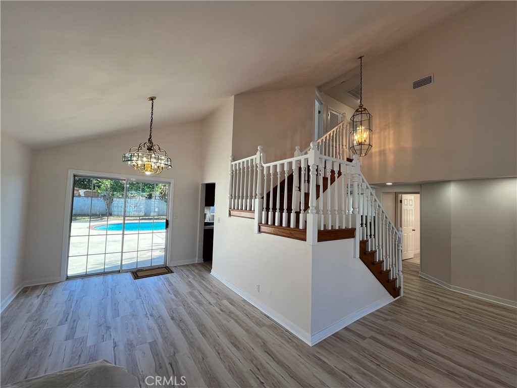7522 Balcom Avenue Reseda, CA 91335 - Photo 6 of 22 a view of entryway and hall with wooden floor