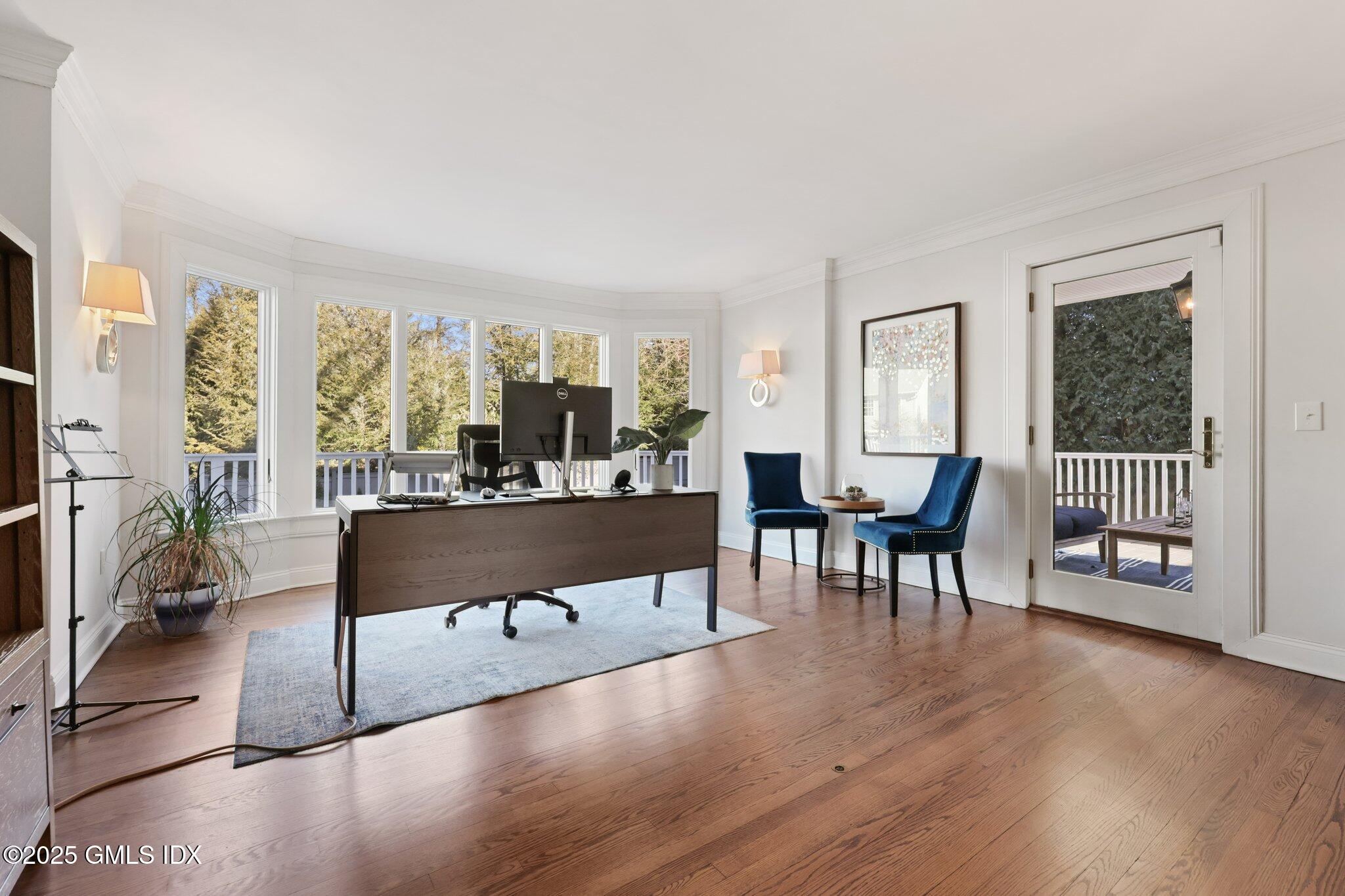 81 Hendrie Avenue Riverside, CT 06878 - Photo 14 of 35 a living room with furniture and a large window