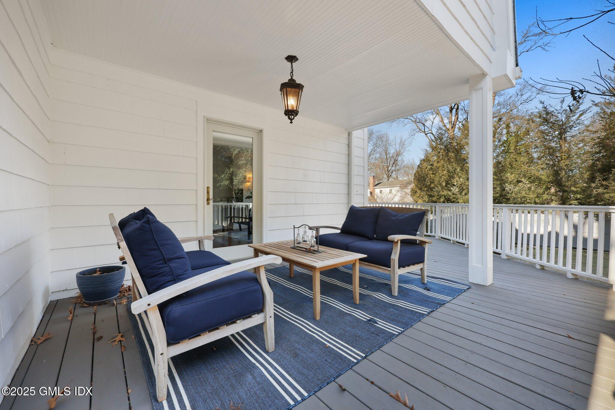 81 Hendrie Avenue Riverside, CT 06878 - Photo 15 of 35 a outdoor space with wooden floor and furniture