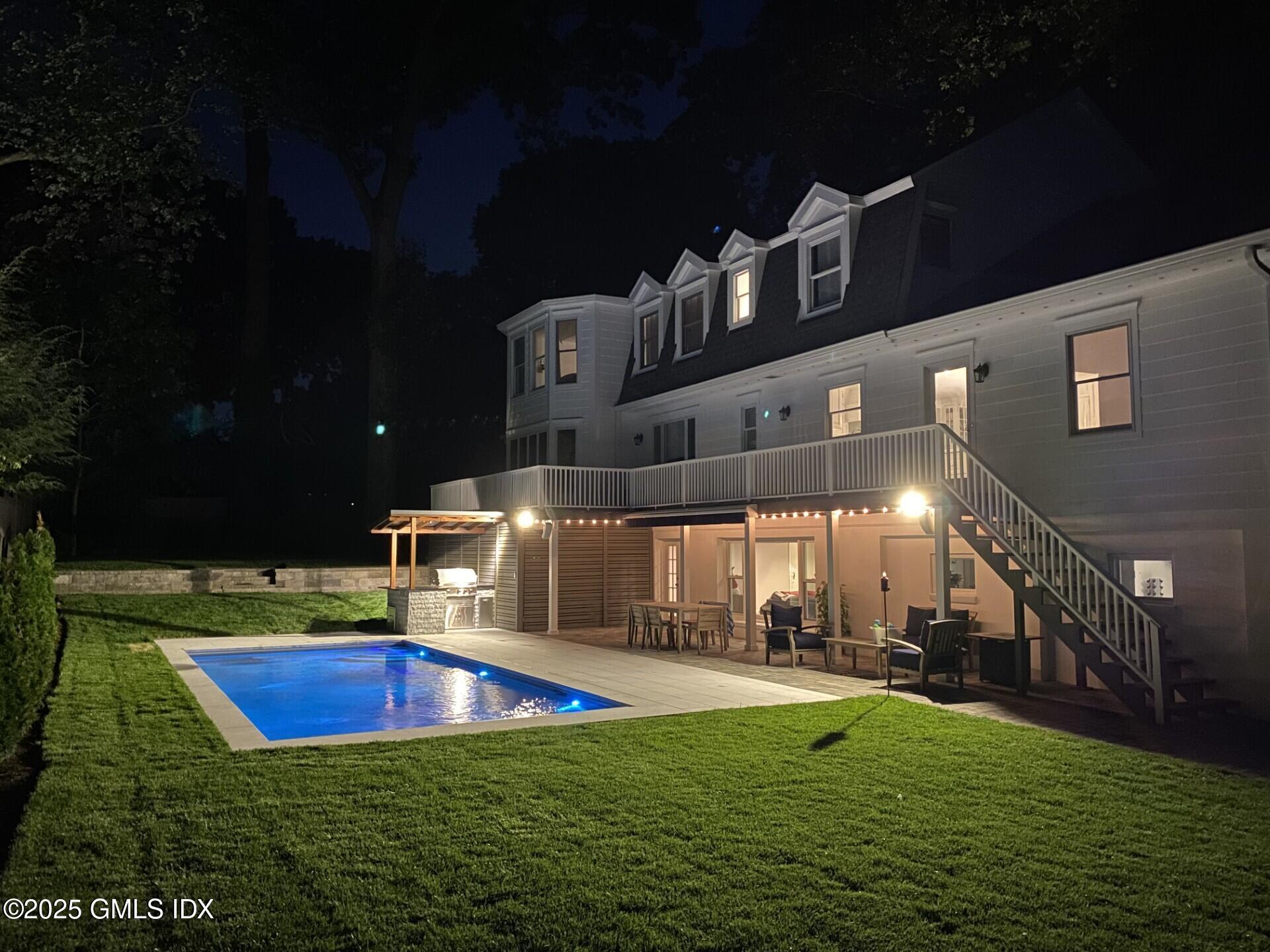 81 Hendrie Avenue Riverside, CT 06878 - Photo 2 of 35 a view of a house with swimming pool