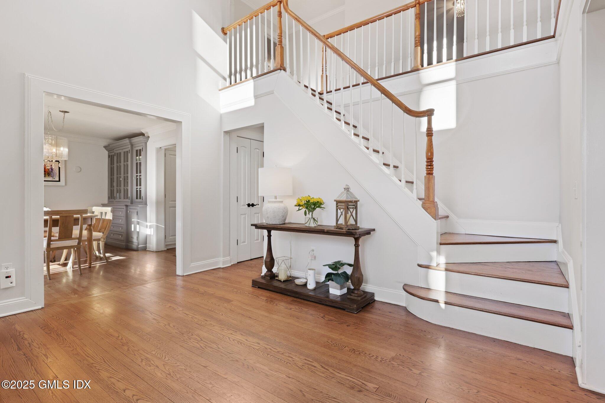 81 Hendrie Avenue Riverside, CT 06878 - Photo 3 of 35 a view of entryway and hall with wooden floor