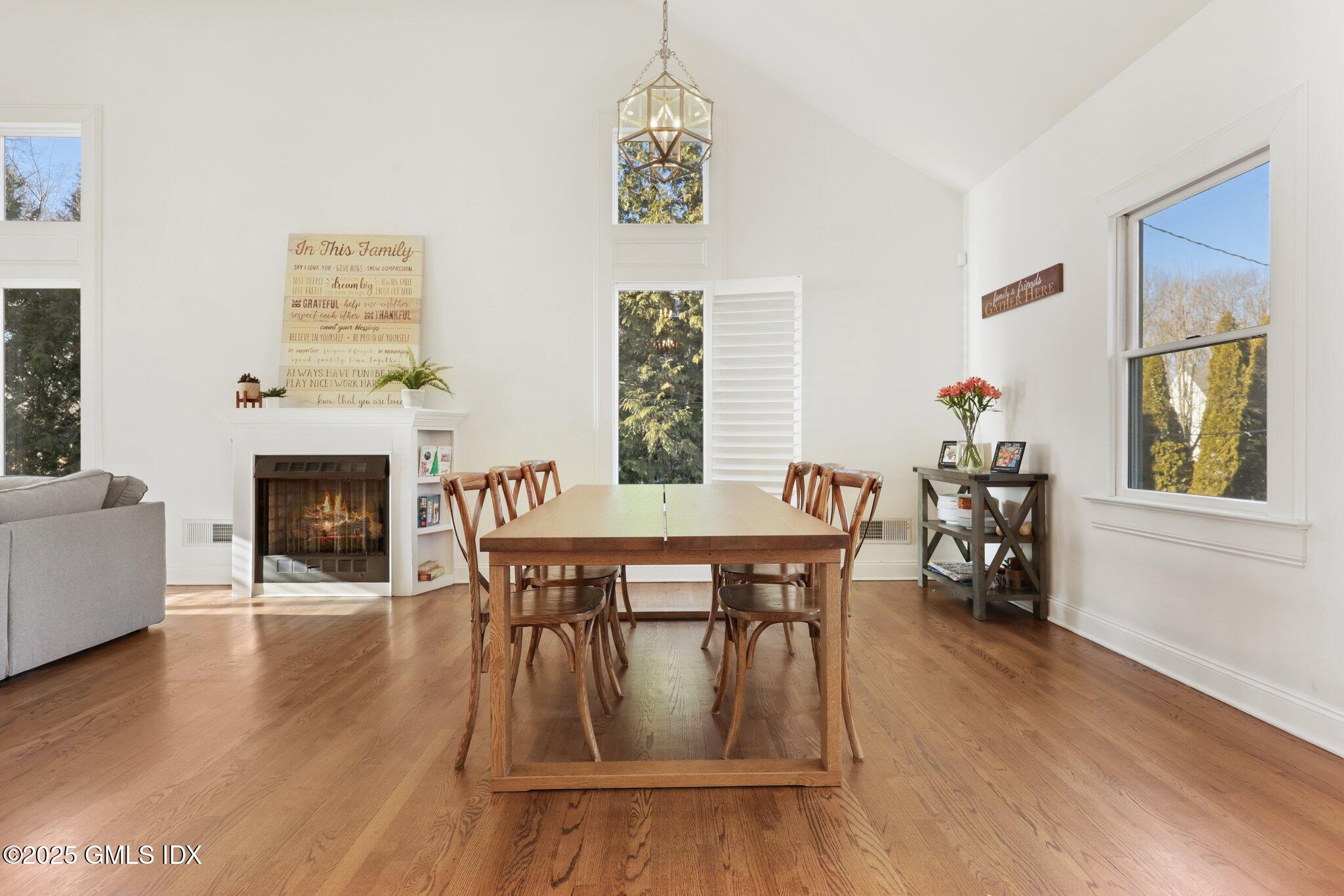 81 Hendrie Avenue Riverside, CT 06878 - Photo 7 of 35 a view of a dining room with furniture window and wooden floor