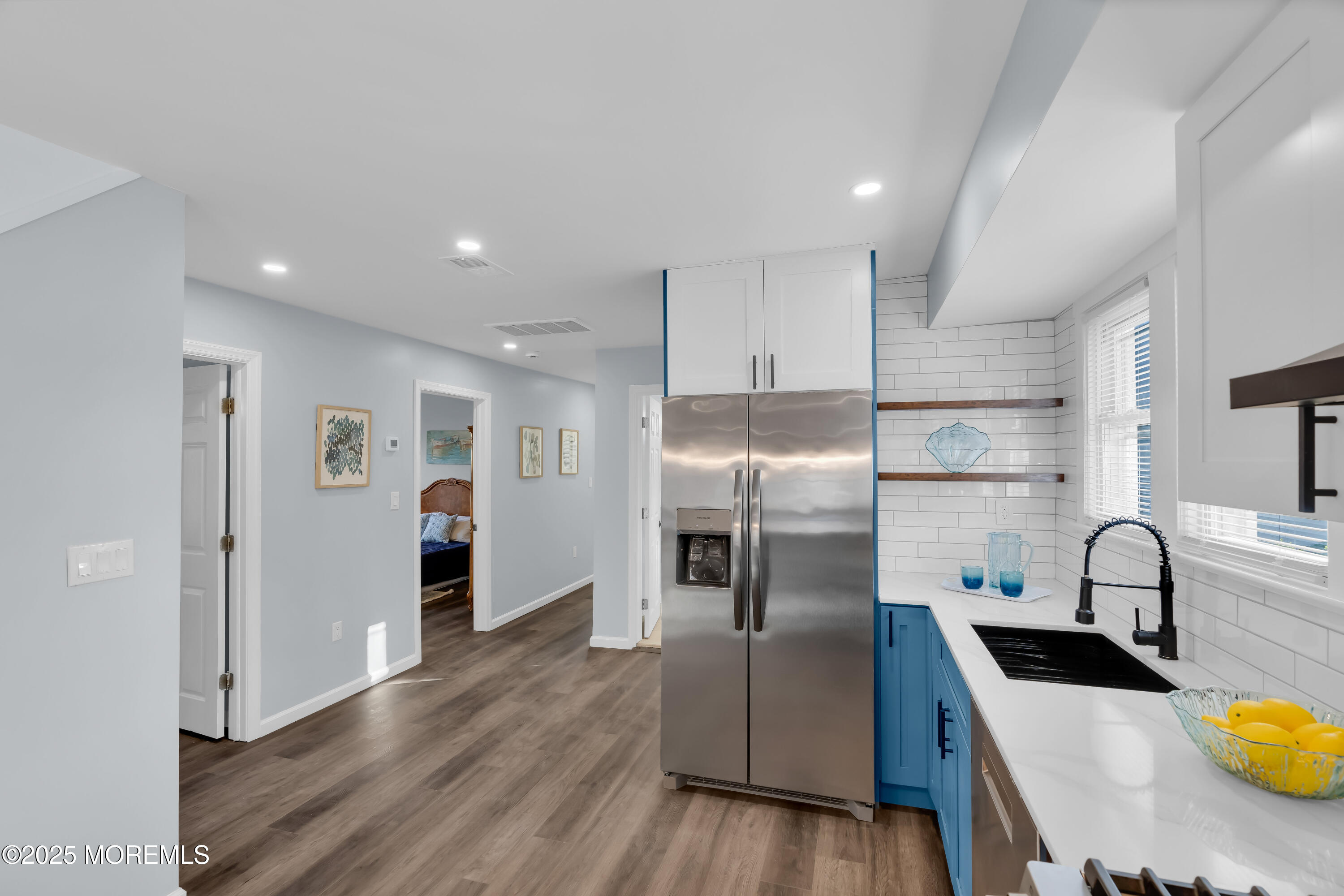 166 Shore Boulevard Keansburg, NJ 07734 - Photo 13 of 36 a kitchen with stainless steel appliances granite countertop a sink a stove and a refrigerator
