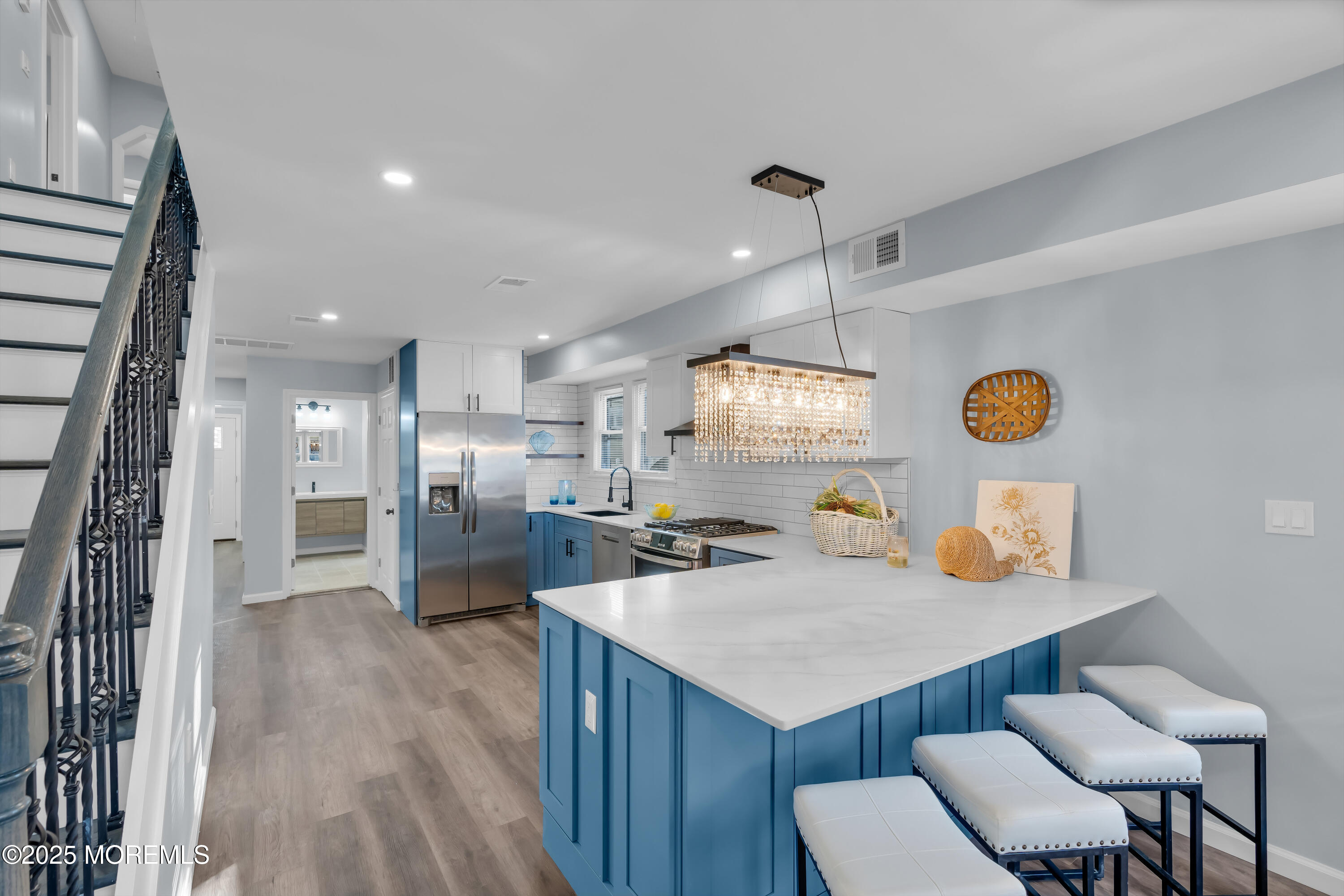166 Shore Boulevard Keansburg, NJ 07734 - Photo 21 of 36 a kitchen with refrigerator and chairs