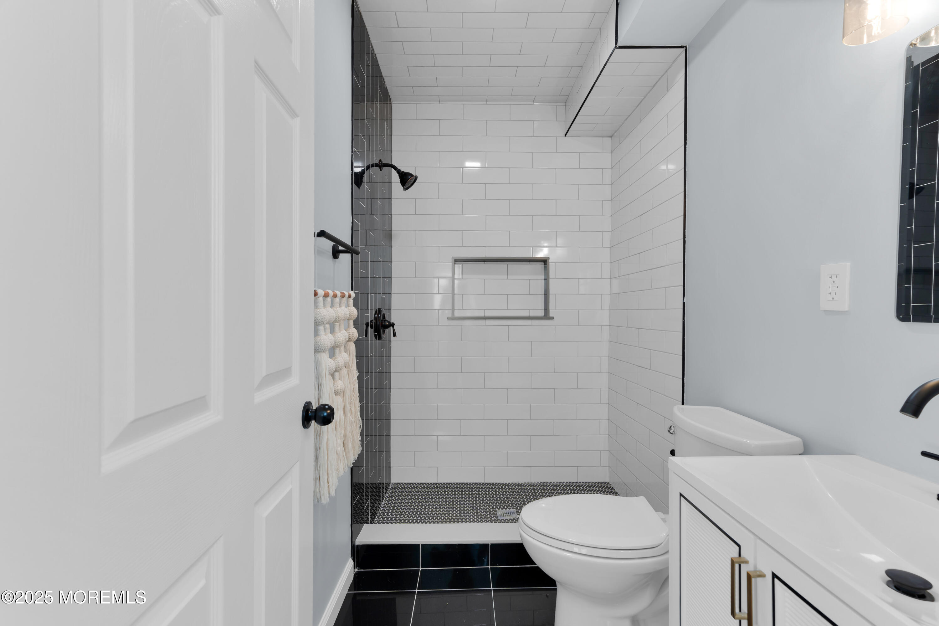 166 Shore Boulevard Keansburg, NJ 07734 - Photo 26 of 36 a bathroom with a sink toilet and shower