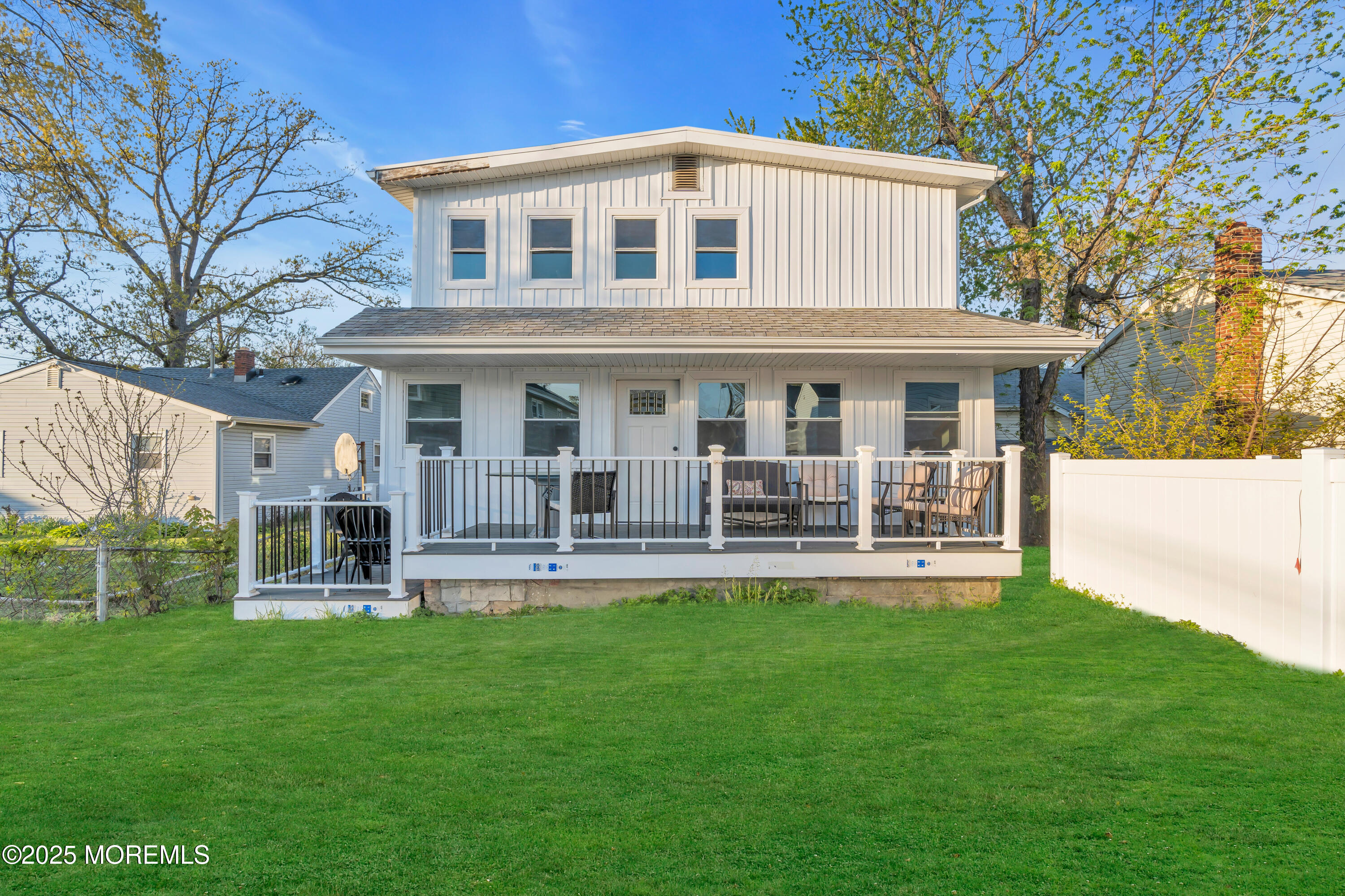 166 Shore Boulevard Keansburg, NJ 07734 - Photo 34 of 36 a front view of a house with a yard