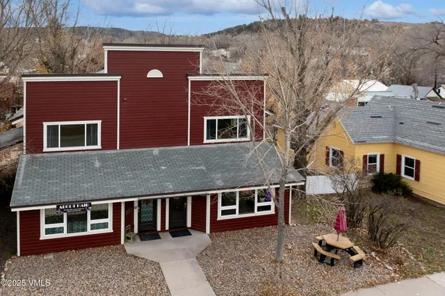a house view with a backyard space