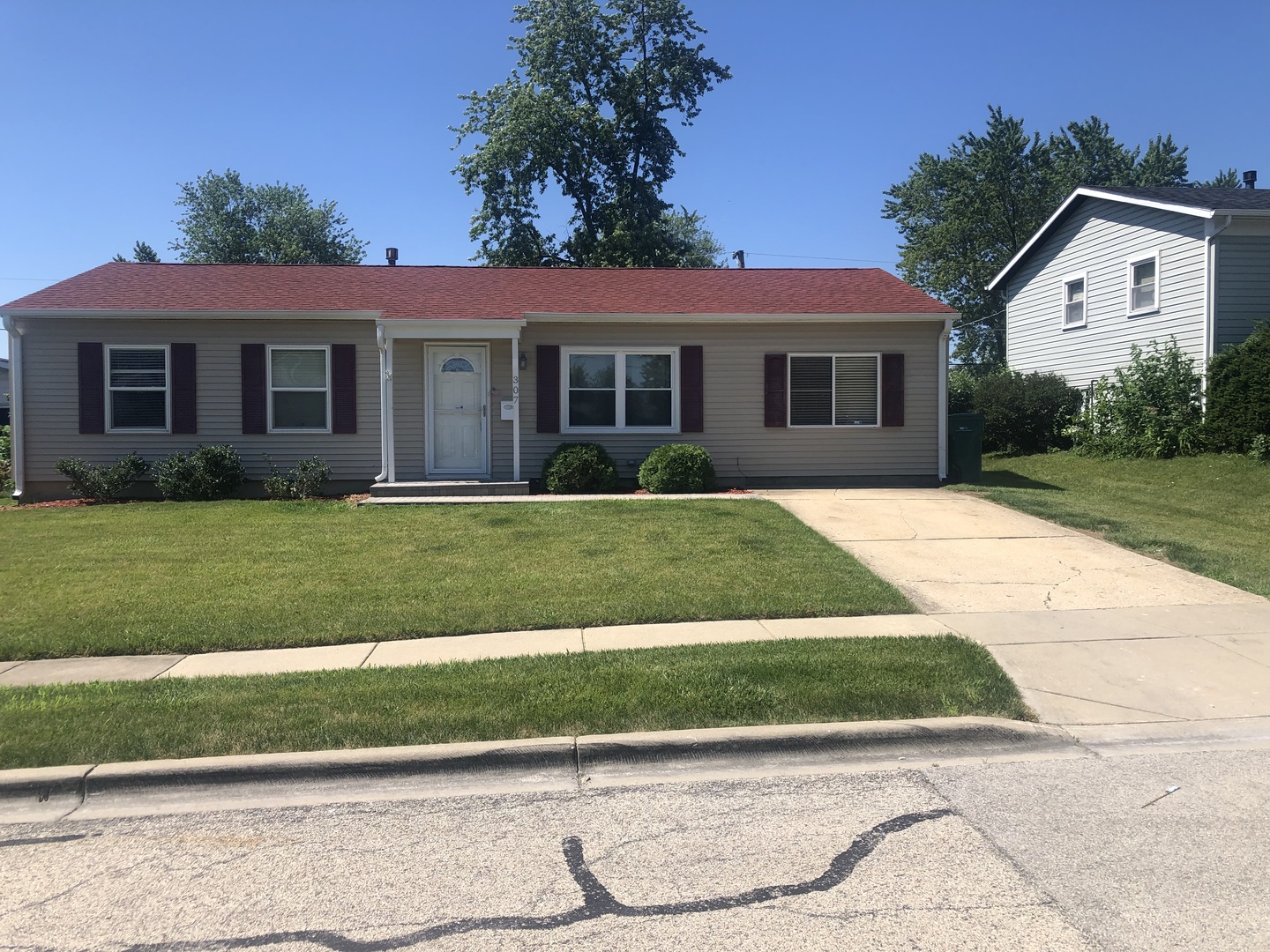 307 Karen Avenue Romeoville, IL 60446 - Photo 1 of 20 a front view of a house with a yard