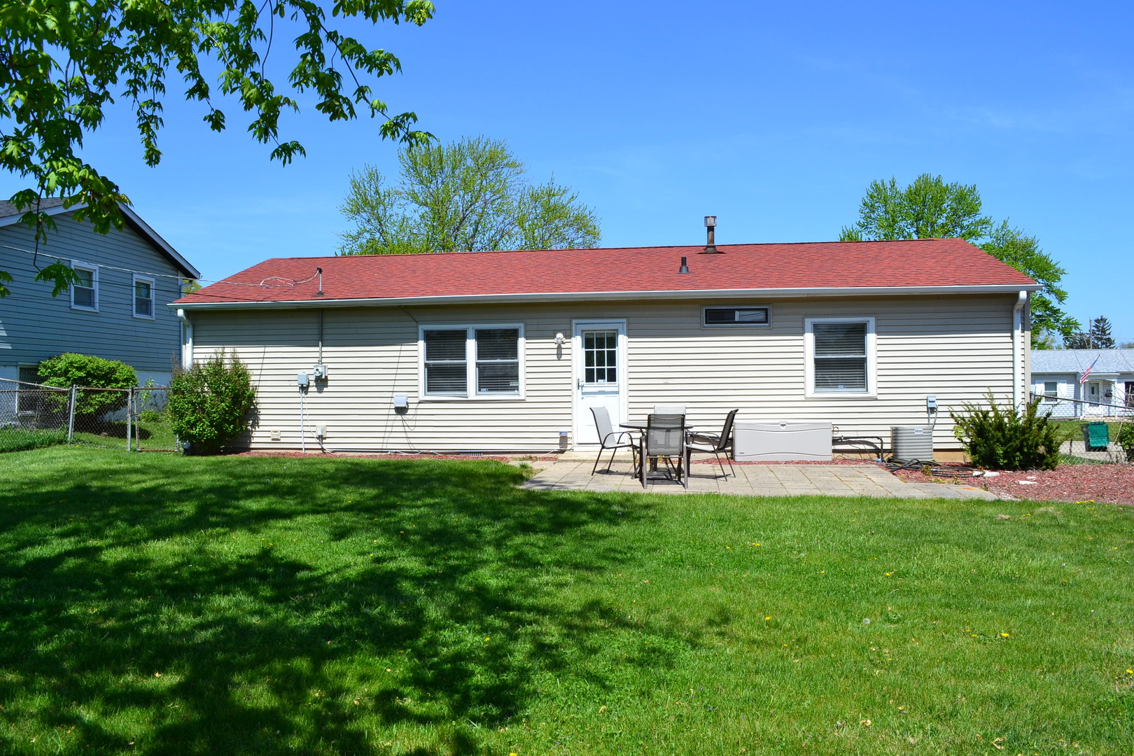 307 Karen Avenue Romeoville, IL 60446 - Photo 17 of 20 a house view with a sitting space and garden