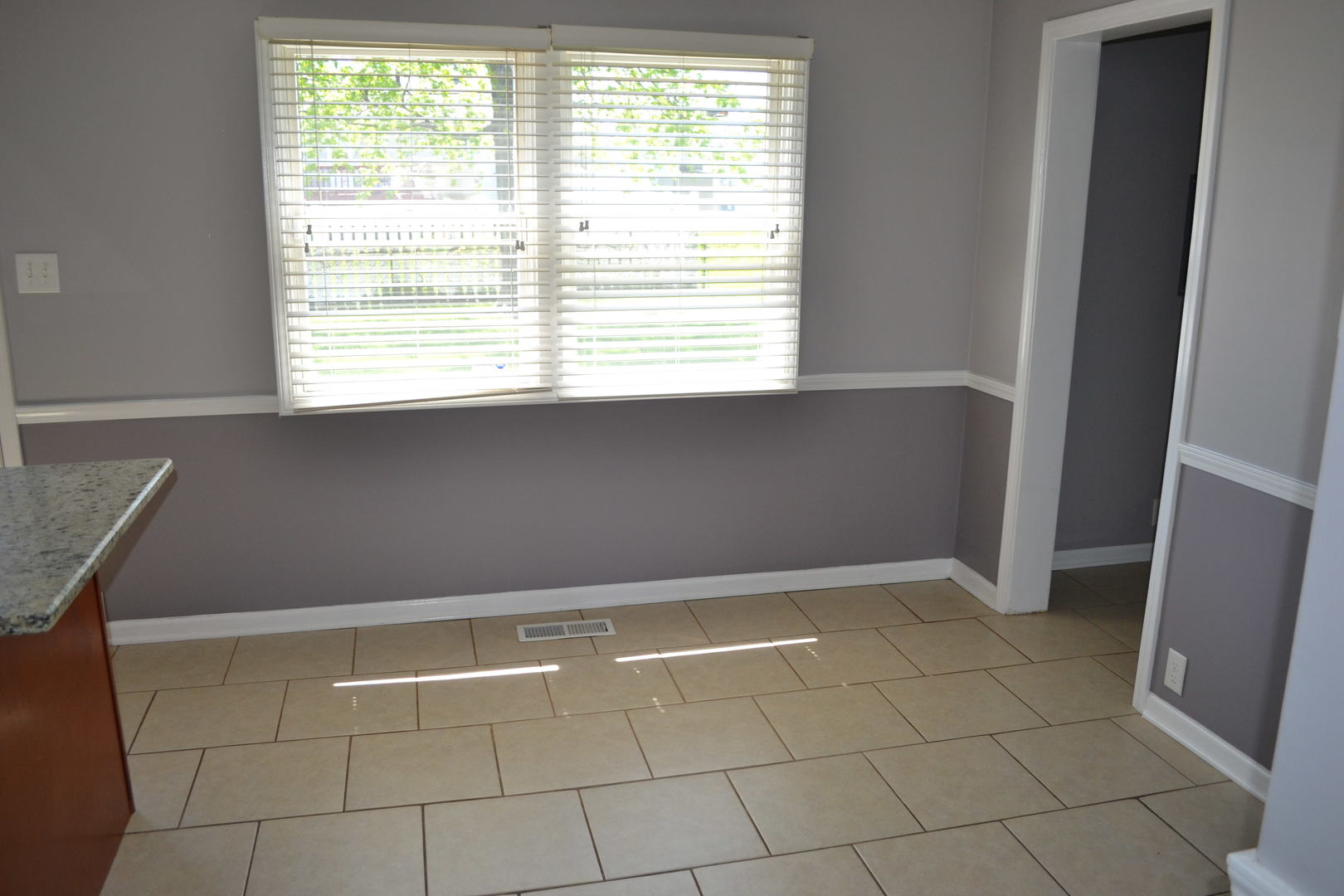 307 Karen Avenue Romeoville, IL 60446 - Photo 6 of 20 a view of an empty room with a window