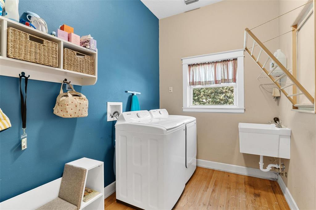 10616 Poe Street Leesburg, FL 34788 - Photo 26 of 54 a utility room with dryer and washer