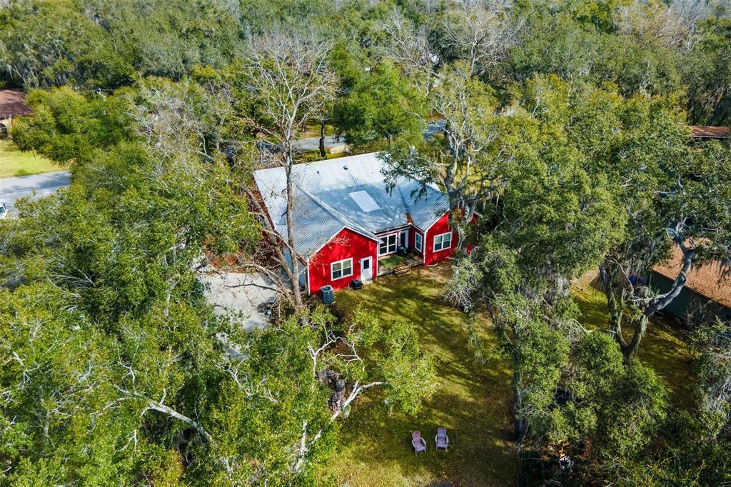 10616 Poe Street Leesburg, FL 34788 - Photo 52 of 54 an aerial view of a house with an outdoor space