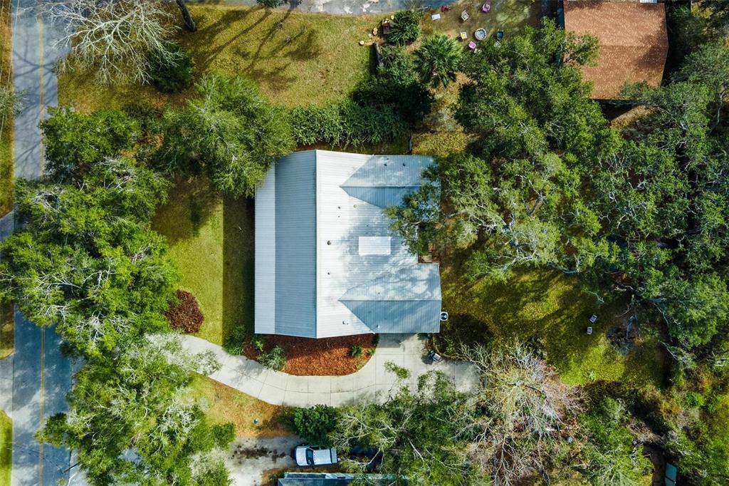 10616 Poe Street Leesburg, FL 34788 - Photo 54 of 54 an aerial view of residential house with outdoor space