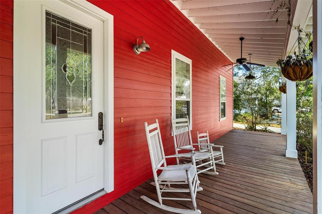 10616 Poe Street Leesburg, FL 34788 - Photo 8 of 54 a view of a house with a patio