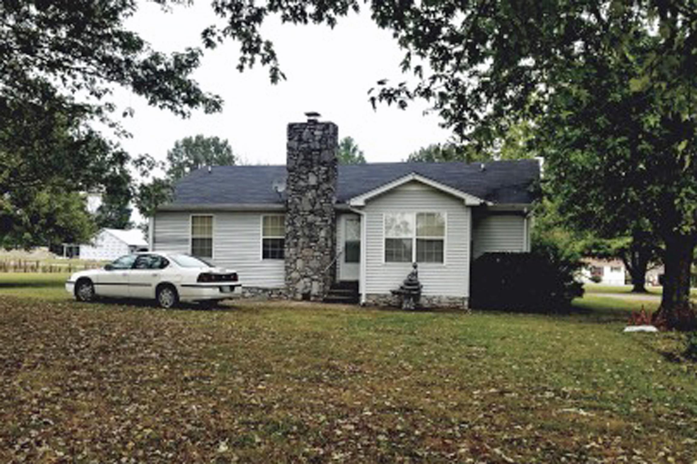 3267 Friendship Road Cross Plains, TN 37049 - Photo 10 of 15 a view of white house with a yard