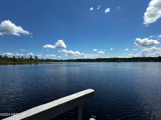 a view of a lake from a balcony