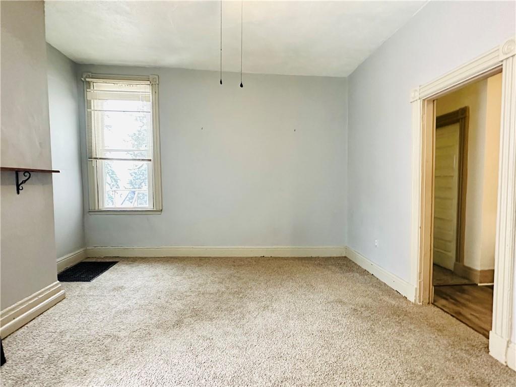 435 Catoma Street Pittsburgh, PA 15212 - Photo 2 of 9 an empty room with a window