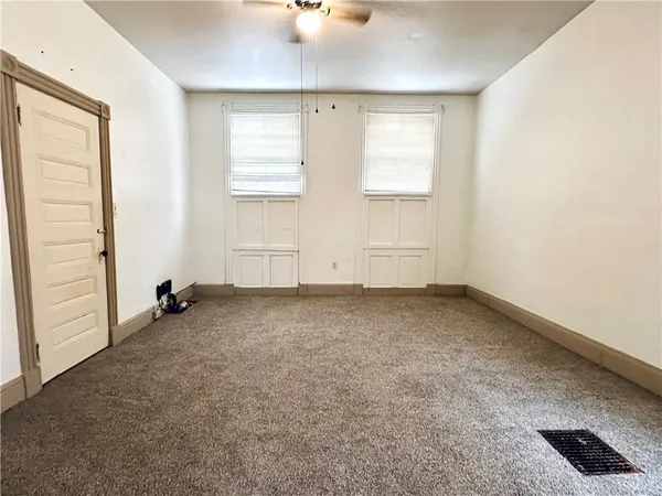 an empty room with windows