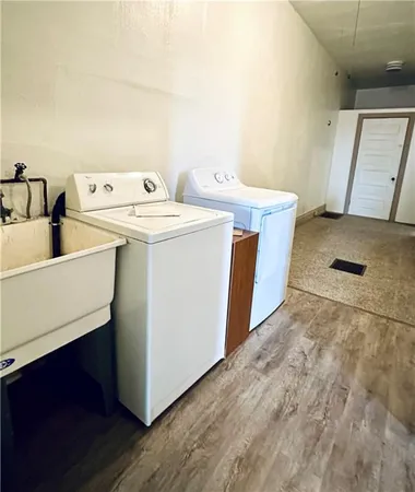 a utility room with dryer and washer