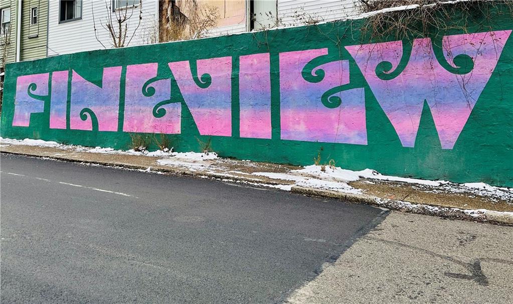 435 Catoma Street Pittsburgh, PA 15212 - Photo 9 of 9 a street sign that is on the side of the road