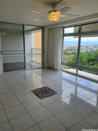 a view of a room with a large window