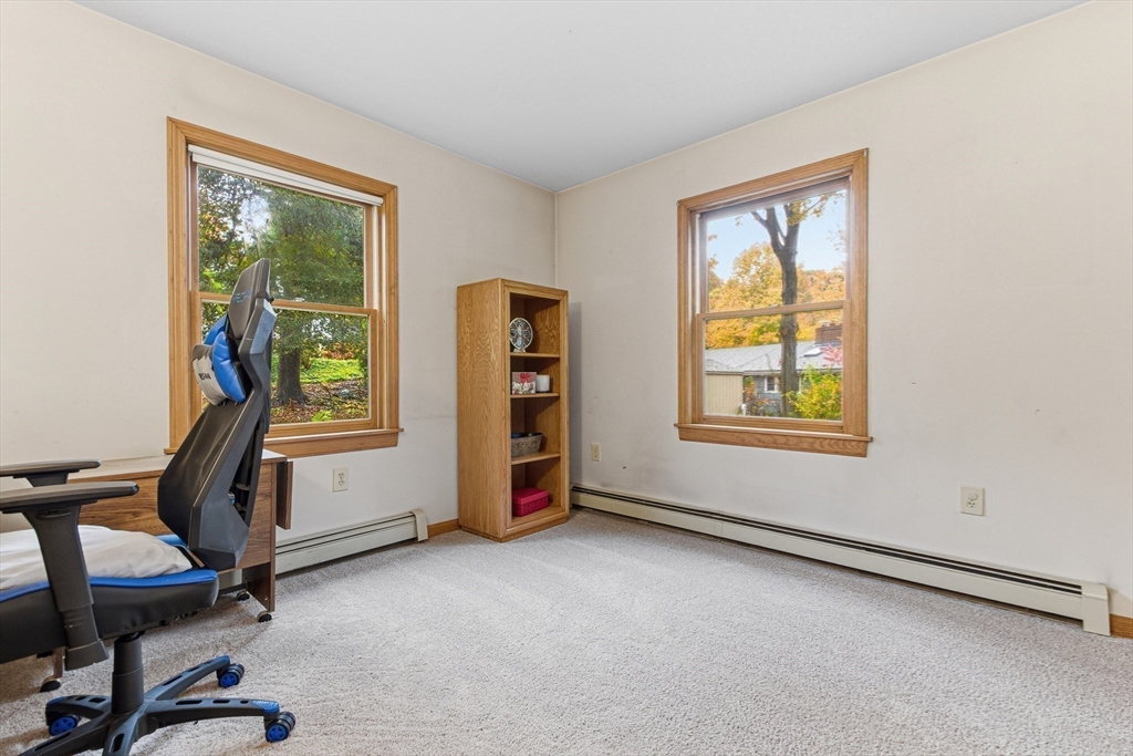 7 John Street Southborough, MA 01772 - Photo 16 of 30 a view of a workspace with furniture and a window