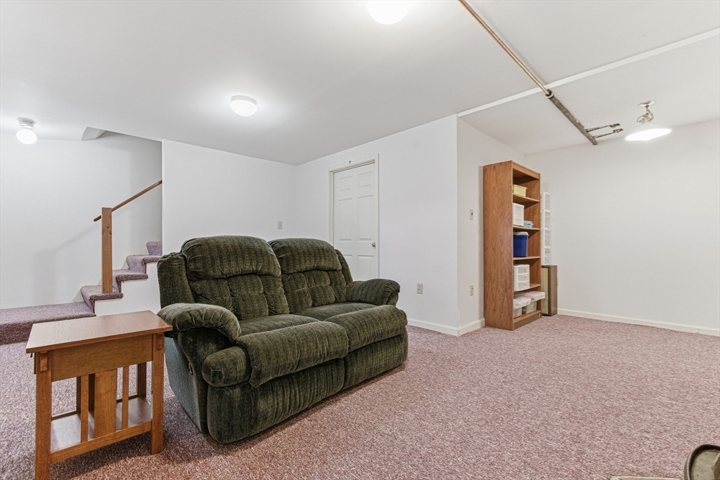 7 John Street Southborough, MA 01772 - Photo 23 of 30 a living room with furniture and a window
