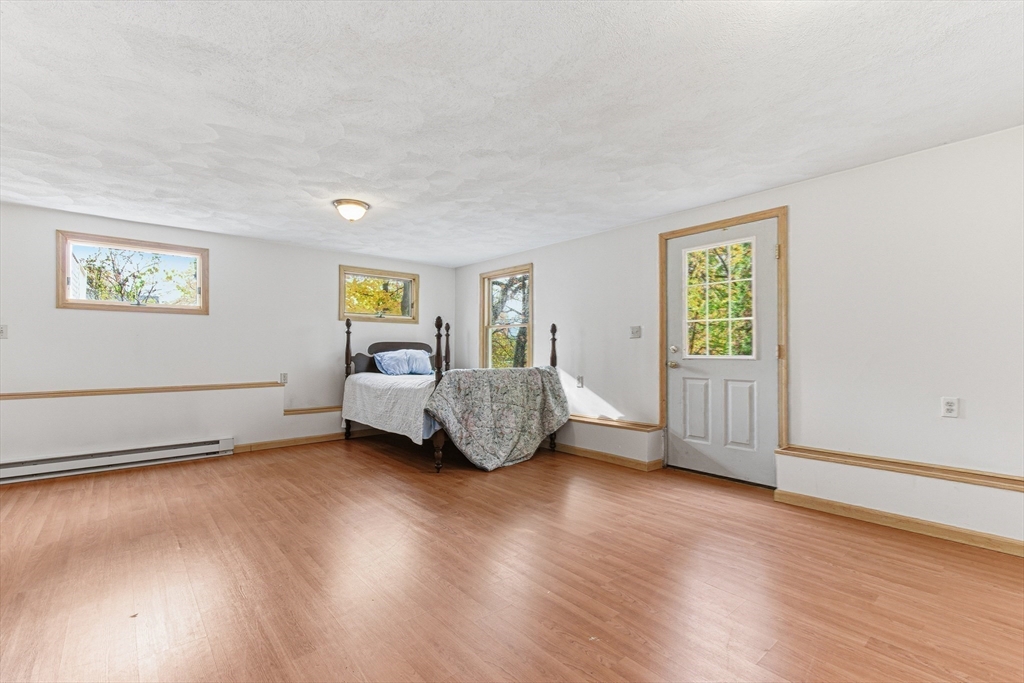 7 John Street Southborough, MA 01772 - Photo 26 of 30 a living room with furniture and a window