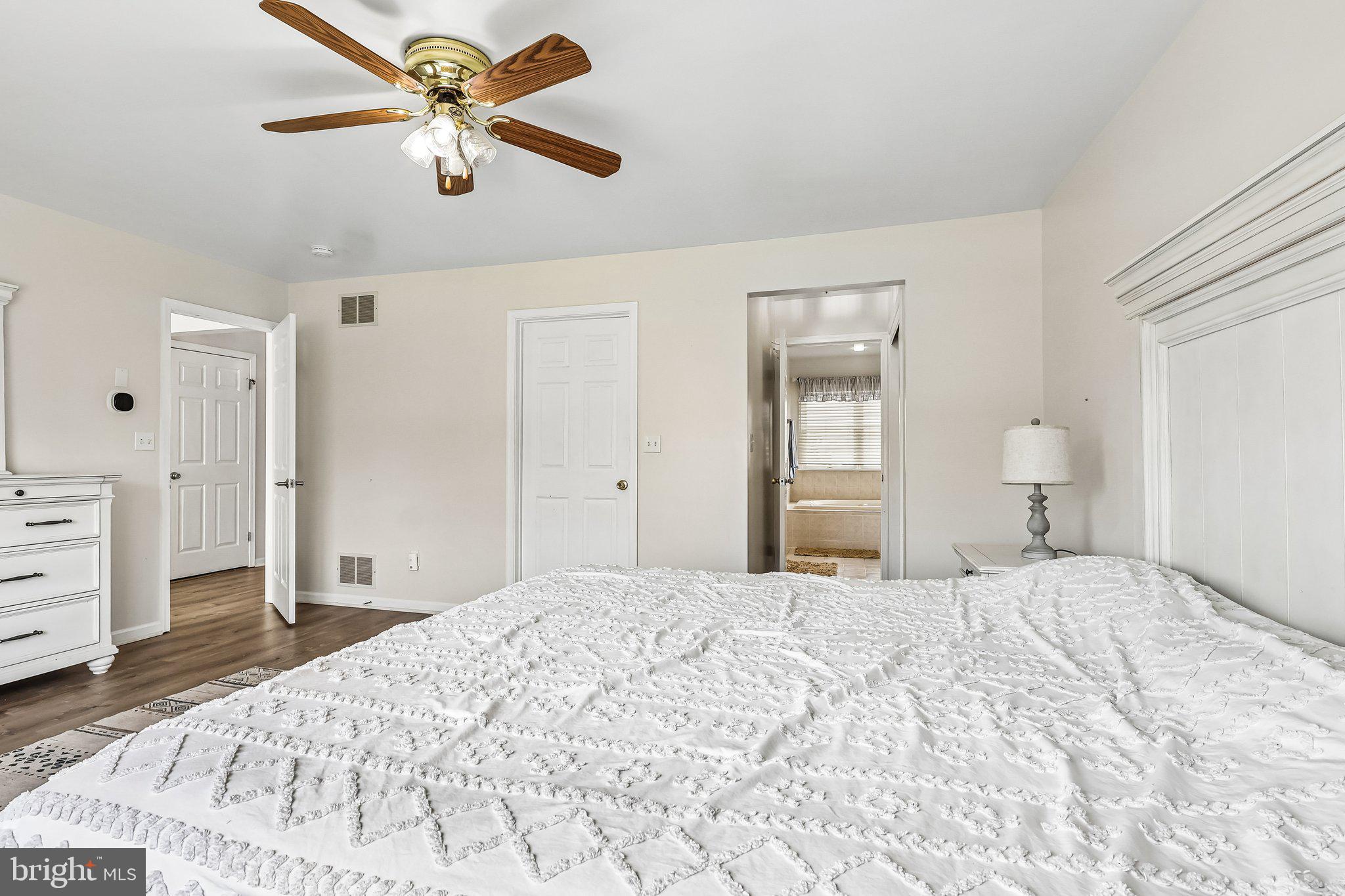2 Carney Way Hamilton, NJ 08620 - Photo 26 of 72 a bedroom with a bed and a chandelier