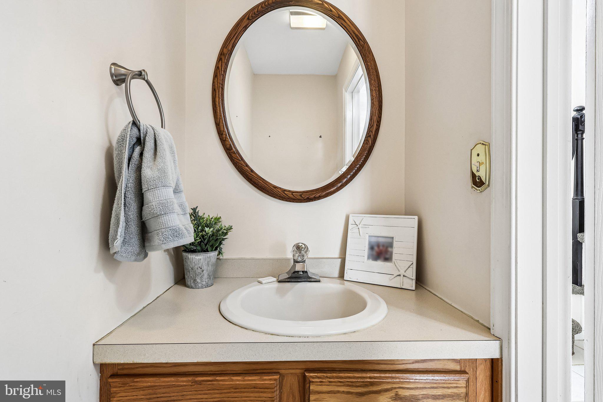 2 Carney Way Hamilton, NJ 08620 - Photo 39 of 72 a bathroom with a sink and a mirror